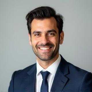 Professional headshot of André Pereira, Junior Photographer
